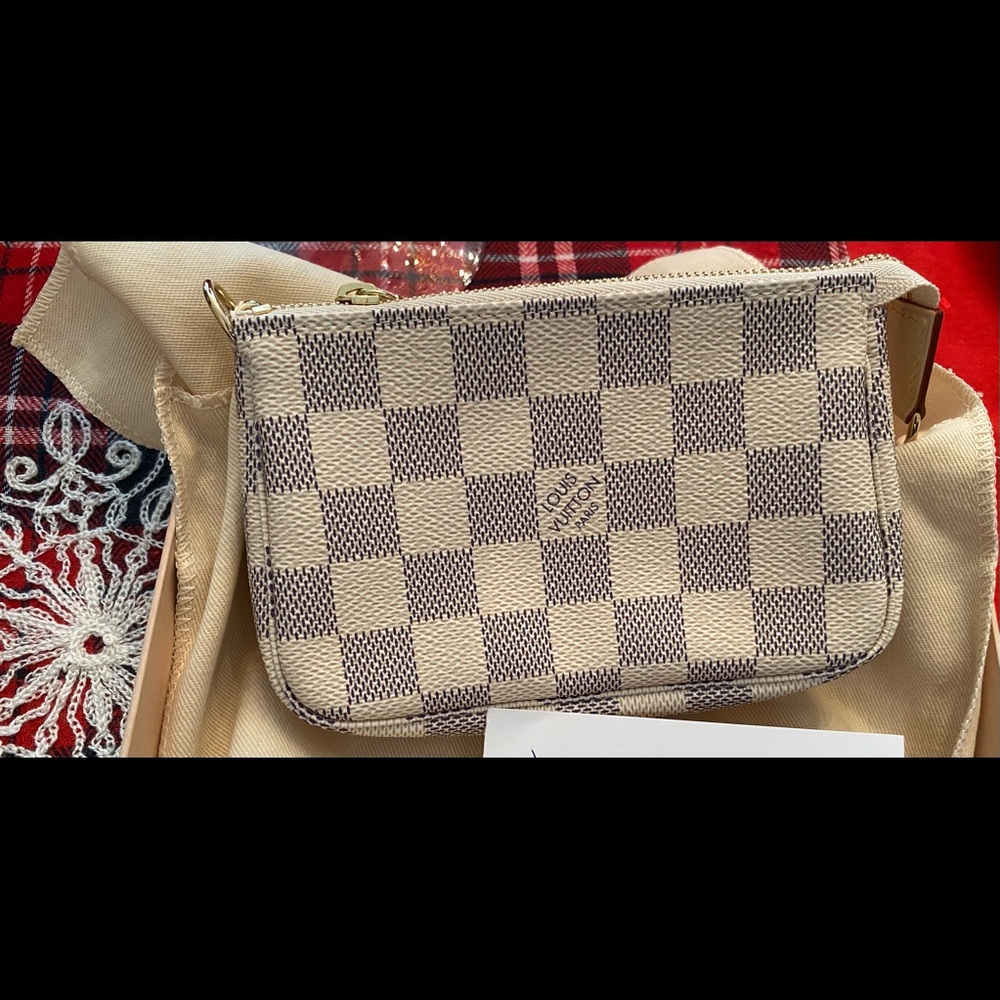 Mini pochette accessories in DA